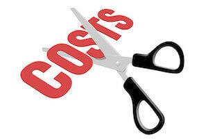 Symbolic picture of scissors cutting word "cost" in half.